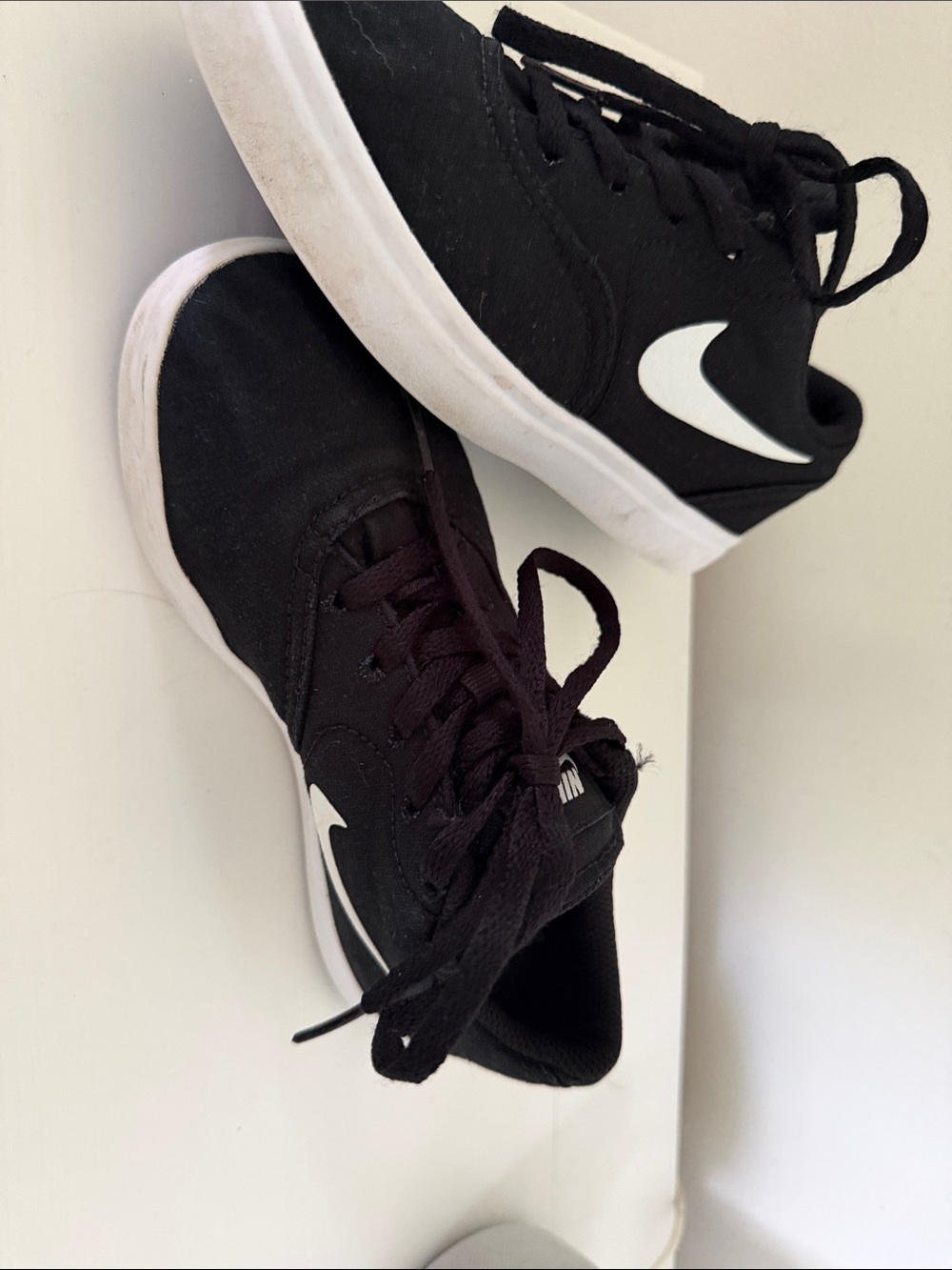 Nike Kids Black Sneakers with White Swoosh